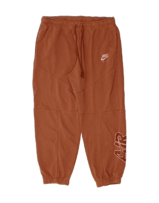 NIKE Womens Graphic Tracksuit Trousers Joggers UK 16 Large  Brown Cotton Trousers Capri Summer